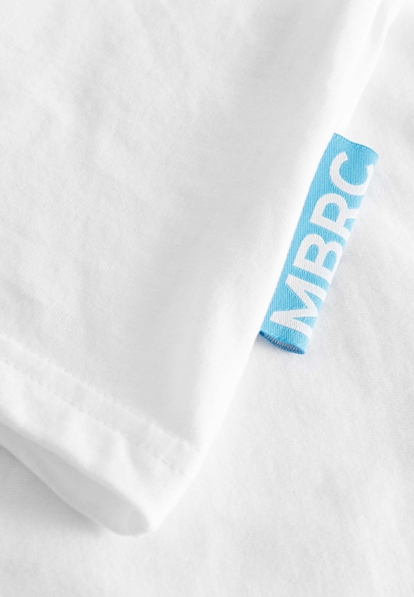 MBRC WOMEN SUSTAINABLE WHITE T-SHIRT "DARK BLUE LOGO" - INSERT